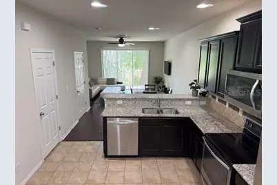 8723 Turnstone Haven Place, Tampa, FL 33619 - Photo 4