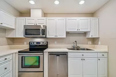 1200 Tarpon Woods Blvd #Q-8, Palm Harbor, FL 34685 - Photo 6