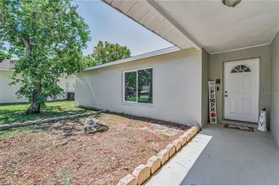 11121 Peppertree Lane, Port Richey, FL 34668 - Photo 10