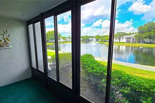 1109 Pine Ridge Cir W, Tarpon Springs, FL 34688 - Photo 12