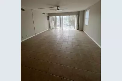 10355 Paradise Boulevard #104, Treasure Island, FL 33706 - Photo 2