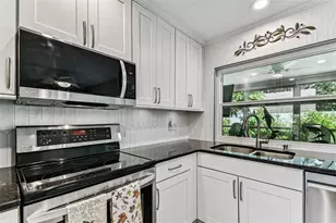 2834 Thistle Ct E, Palm Harbor, FL 34684 - Photo 16