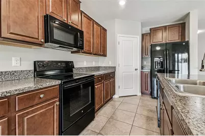 7423 French Marigold Avenue, Tampa, FL 33619 - Photo 32