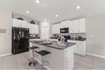 3802 Daisy Bloom Place, Tampa, FL 33619 - Photo 12