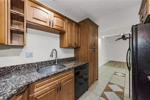 1109 Pine Ridge Cir W, Tarpon Springs, FL 34688 - Photo 18