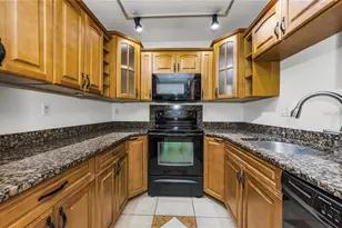 1109 Pine Ridge Cir W, Tarpon Springs, FL 34688 - Photo 16