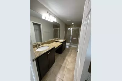 8827 Turnstone Haven Place, Tampa, FL 33619 - Photo 30