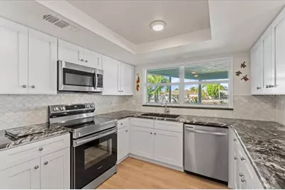 5028 Ensign Loop, New Port Richey, FL 34652 - Photo 18