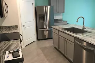 7729 Rosewood Garden Loop, Tampa, FL 33637 - Photo 4