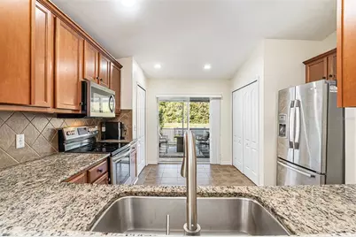 9928 Torrisdale Loop, Land O Lakes, FL 34638 - Photo 18