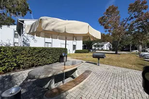 1372 Pine Ridge Cir E, Tarpon Springs, FL 34688 - Photo 18