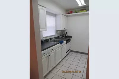 9106 Tudor Drive #L104, Tampa, FL 33615 - Photo 6