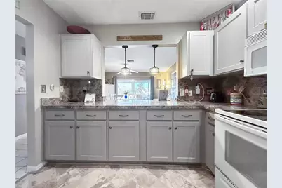 1308 Bluewater Drive, Sun City Center, FL 33573 - Photo 12