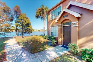 9554 Lake Chase Island Way, Tampa, FL 33626 - Photo 1