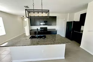 7641 Tuscan Bay Cir, Wesley Chapel, FL 33545 - Photo 6