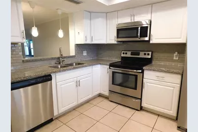 2420 Winding Creek Boulevard #103, Clearwater, FL 33761 - Photo 6