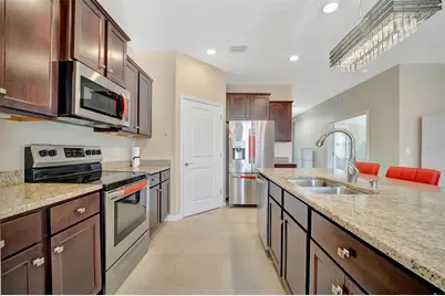 31878 Tansy Bend, Wesley Chapel, FL 33545 - Photo 12