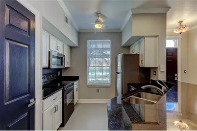 9750 Lake Chase Island Way #9750, Tampa, FL 33626 - Photo 10