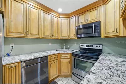 2666 Pine Ridge Way N #C2, Palm Harbor, FL 34684 - Photo 22