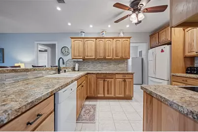 1207 Bluewater Drive, Sun City Center, FL 33573 - Photo 14