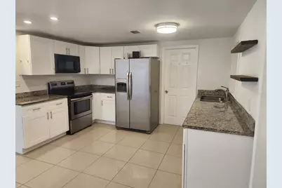 8518 Woodlake Drive, Tampa, FL 33615 - Photo 12