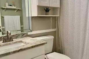 1151 Pine Ridge Cir W, Tarpon Springs, FL 34688 - Photo 20