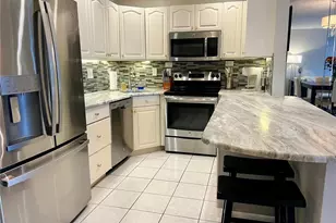 1151 Pine Ridge Cir W, Tarpon Springs, FL 34688 - Photo 8