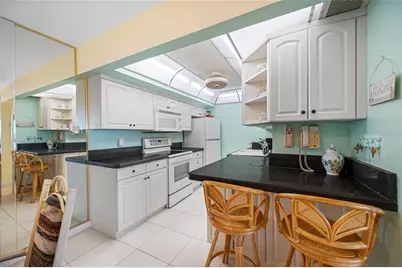 10355 Paradise Boulevard #614, Treasure Island, FL 33706 - Photo 16