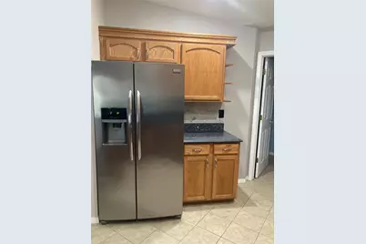 1819 Hammocks Avenue #1819, Lutz, FL 33549 - Photo 8