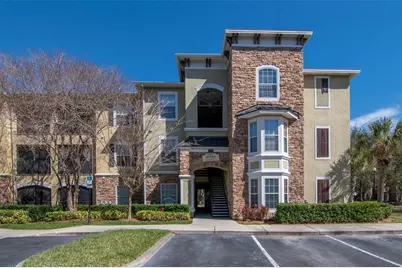 9916 Courtney Palms Boulevard #103, Tampa, FL 33619 - Photo 1