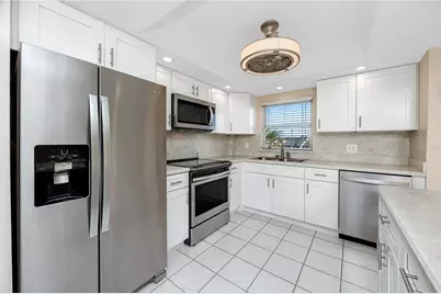 4650 Cove Circle #409, Saint Petersburg, FL 33708 - Photo 12