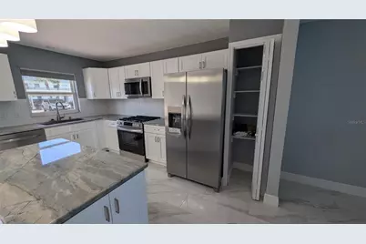 7 Dunoon Place #Unit 104, Dunedin, FL 34698 - Photo 4