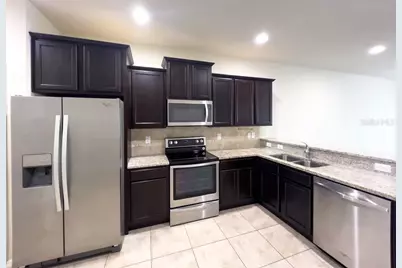 4812 White Sanderling Court, Tampa, FL 33619 - Photo 8