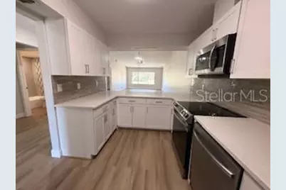 3505 Tarpon Woods Boulevard #J408, Palm Harbor, FL 34685 - Photo 4