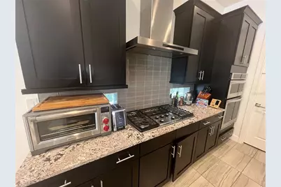 7689 Toscana Boulevard, Orlando, FL 32819 - Photo 6