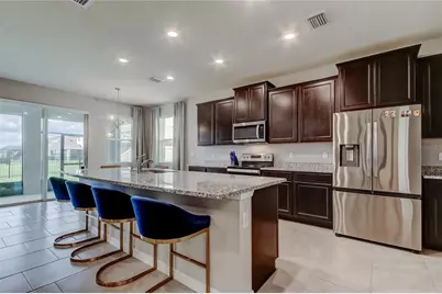 33888 Field Maple Loop, Wesley Chapel, FL 33545 - Photo 16