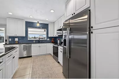 8848 Sunlit Cove Drive NE, Saint Petersburg, FL 33702 - Photo 26