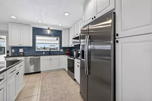 8848 Sunlit Cove Dr NE, Saint Petersburg, FL 33702 - Photo 26