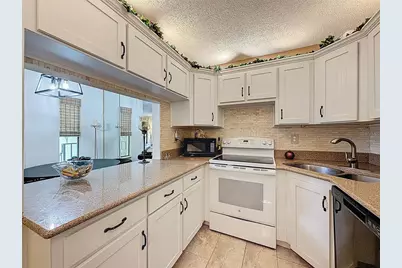 1488 Pine Glen Lane #B2, Tarpon Springs, FL 34688 - Photo 28