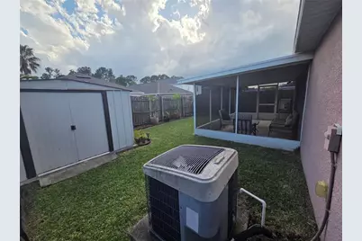 30238 Rattana Court, Wesley Chapel, FL 33545 - Photo 32