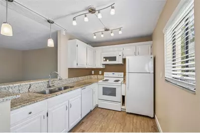 3300 Fox Chase Circle N #202, Palm Harbor, FL 34683 - Photo 16