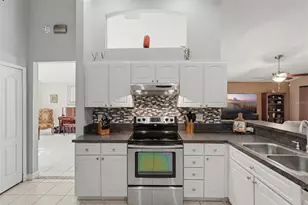 1240 Bluffs Cir, Dunedin, FL 34698 - Photo 10