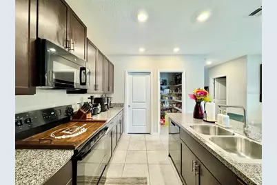 7309 Canterbury Bells Court, Tampa, FL 33619 - Photo 16