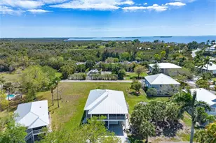 7655 Myrsine Cir, Bokeelia, FL 33922 - Photo 6
