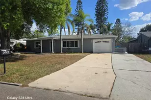 5942 52nd Ave N, Kenneth City, FL 33709 - Photo 1