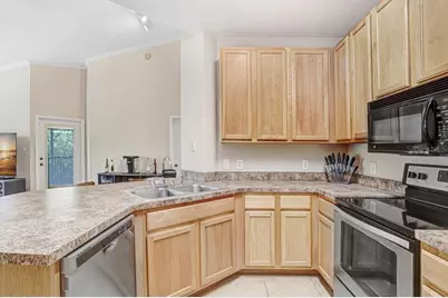2407 Courtney Meadows Court #303, Tampa, FL 33619 - Photo 10