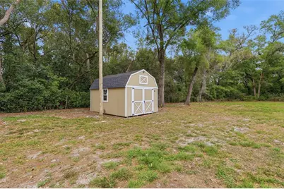 7140 Elwood Road, Zephyrhills, FL 33540 - Photo 32