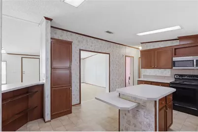 7140 Elwood Road, Zephyrhills, FL 33540 - Photo 14