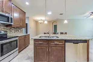 9936 Gap Wedge Drive, San Antonio, FL 33576 - Photo 8