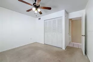 1372 Pine Ridge Cir E, Tarpon Springs, FL 34688 - Photo 20